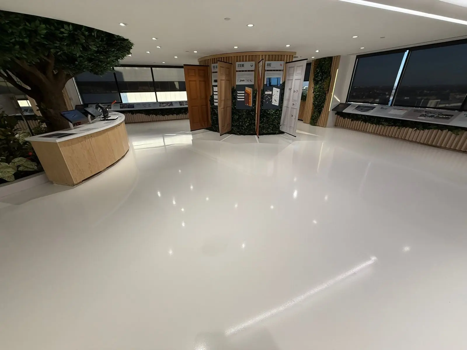 Glossy white showroom epoxy floor